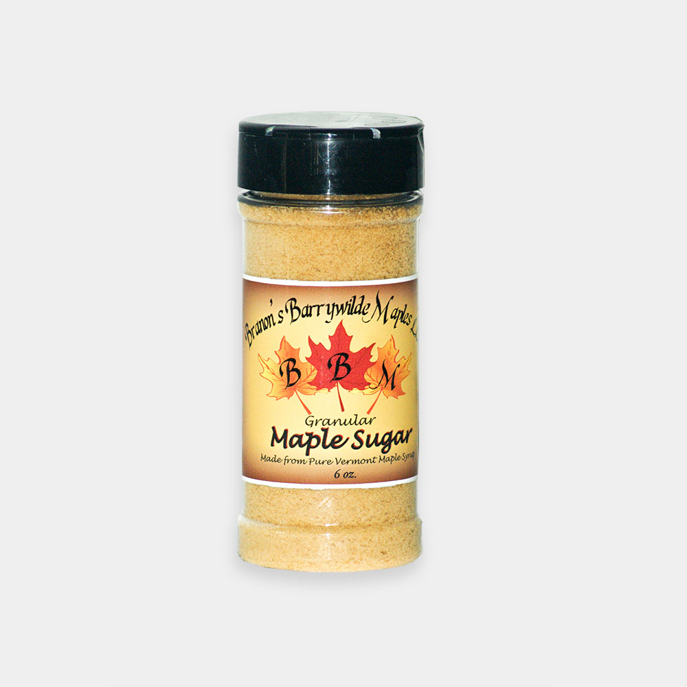 A jar of maple sugar is shown.